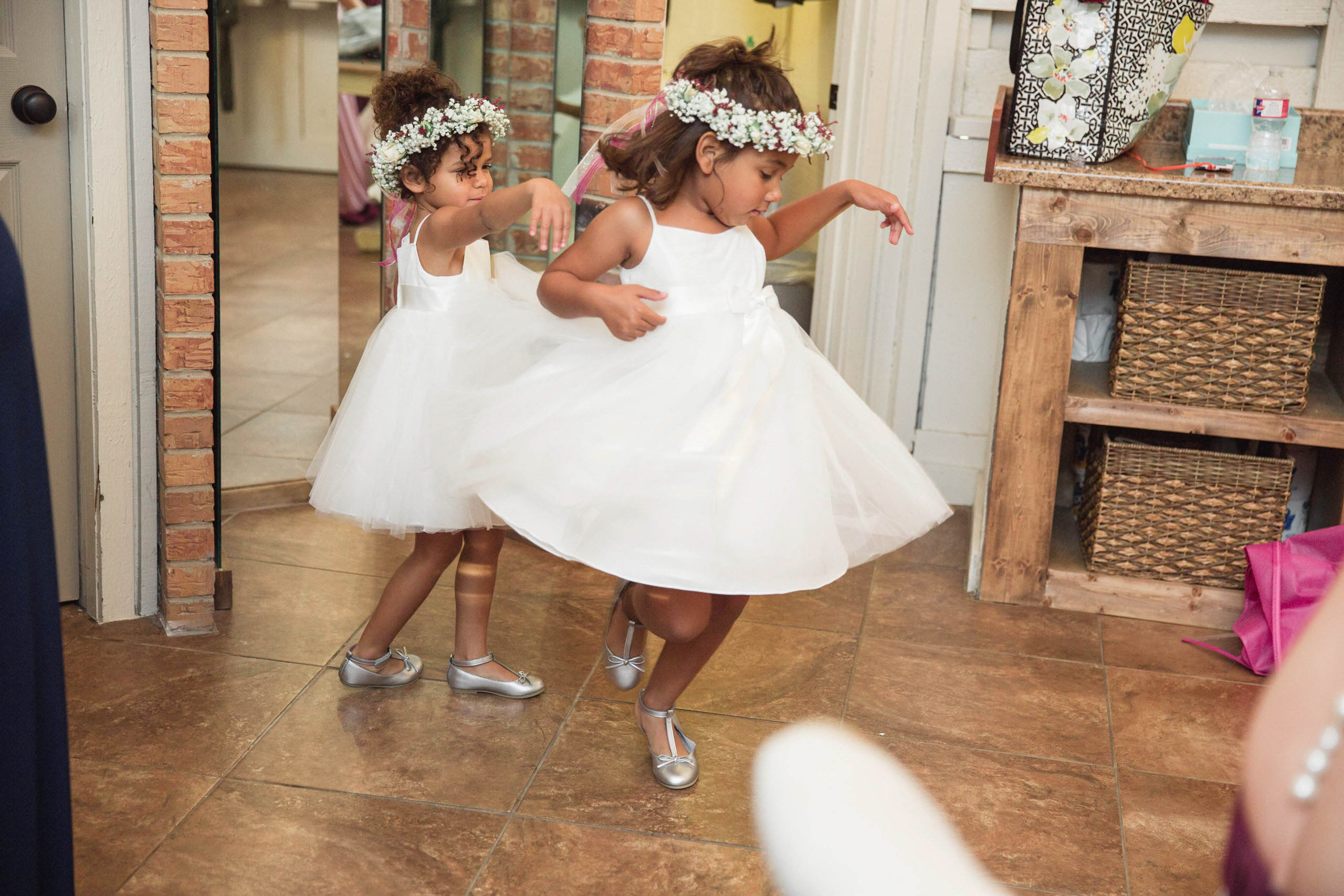 flower girls in white dresses